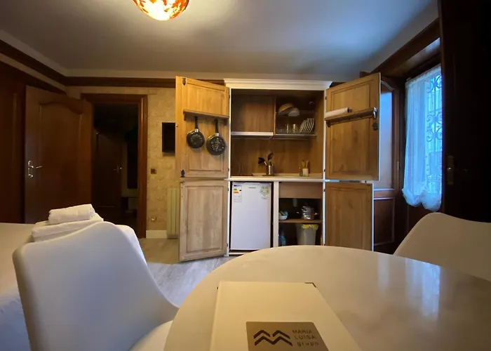 Maria Luisa Apartman *